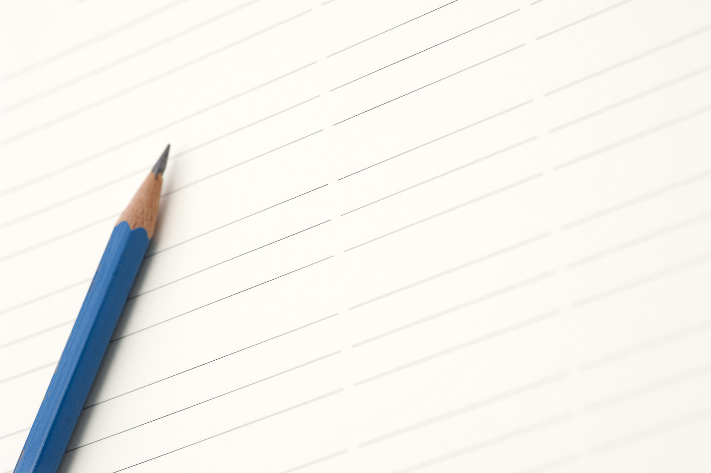 Free image of Sharp blue pencil on lined paper