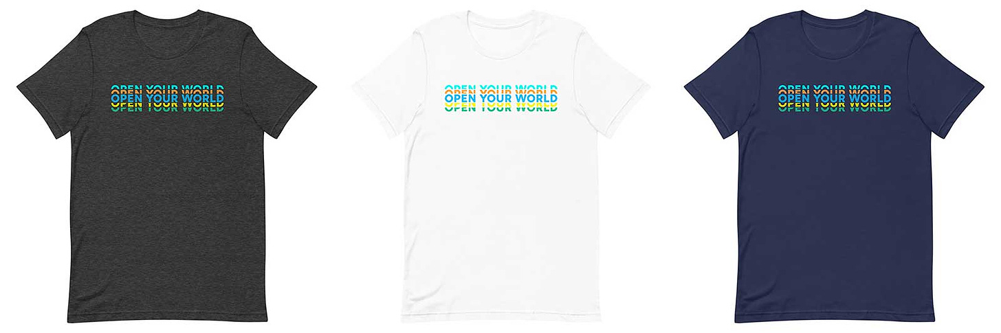 3 tee shirts with the text open your world printed on the front.