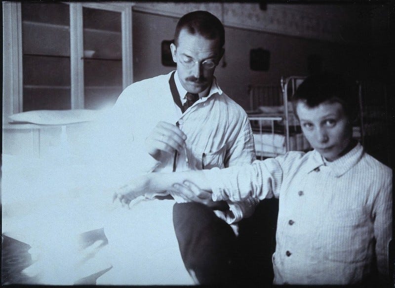 Clemens Peter Pirquet, Freiherr von Cesenatico, and a patient. Photograph.  | Wellcome Collection