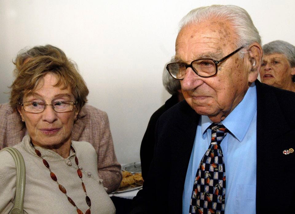 Sir Nicholas Winton shared a moment with one of his "children," Vera Gissingova, in Prague in 2007, when he received Czechoslovakia's highest military decoration for his role in rescuing Czech children from almost certain death in Nazi concentration camps.