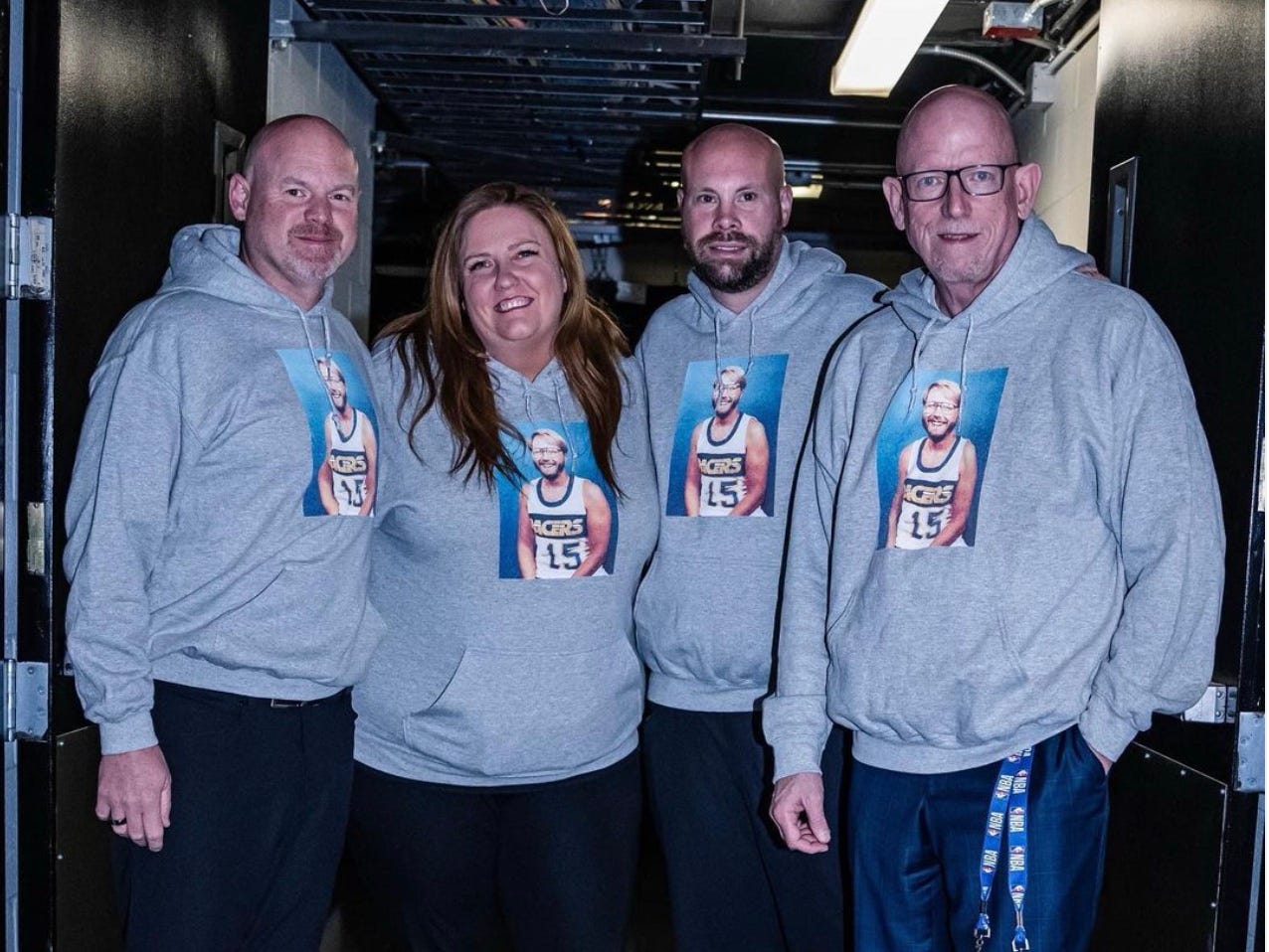 All for Benner: Athletic trainer Carl Eaton, Krissy Myers, equipment manager Josh Conder and radio announcer Mark Boyle wore the hoodie.