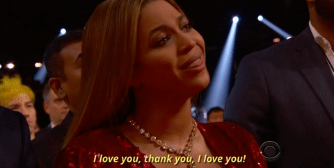 GIF of Beyoncé from the 2017 Grammys telling Adele, "I love you, thank you, I love you!"