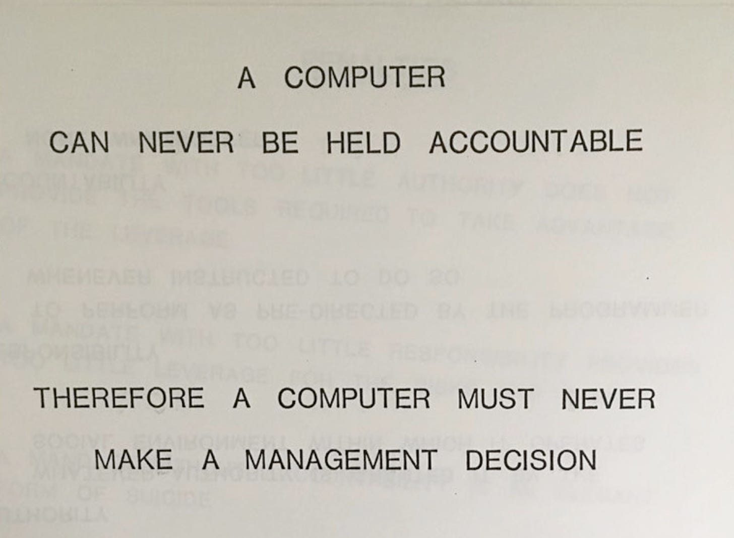 Paper with the text: A computer can never be held accountable therefore a computer must never make a management decision