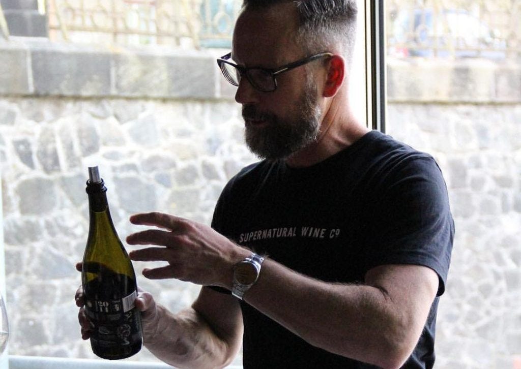 Gregory Collinge presenting his wines, somewhere in the world