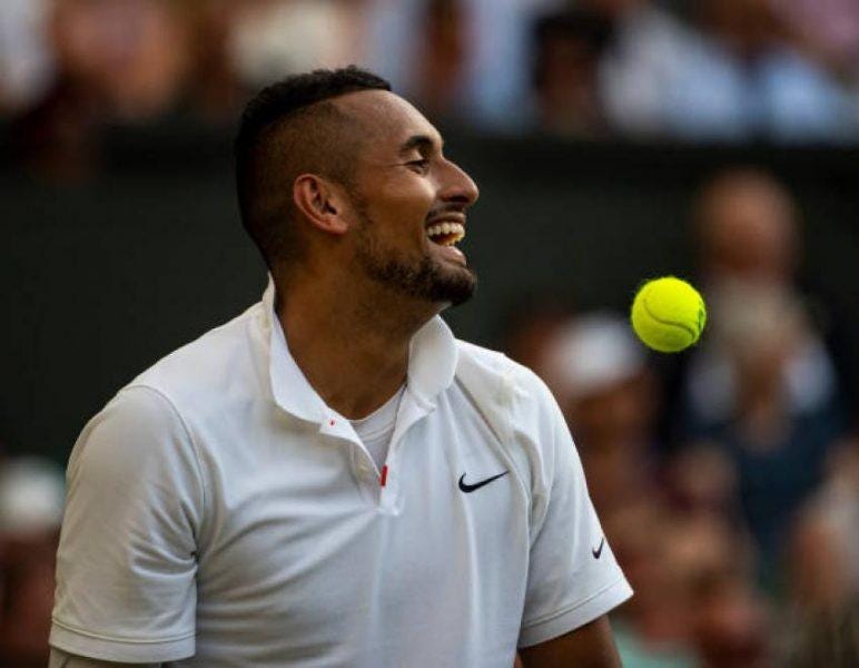 nick kyrgios smacks a forehand shot at rafael nadal chest