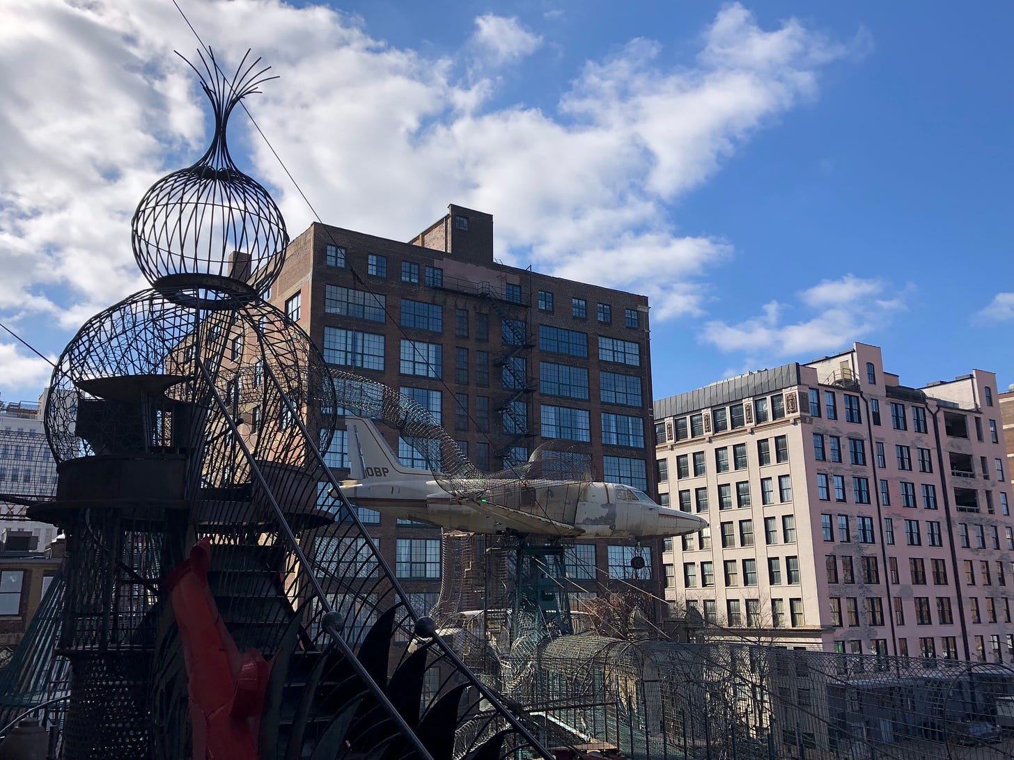 outdoor image of the City Museum, including an old plane and wire walkways