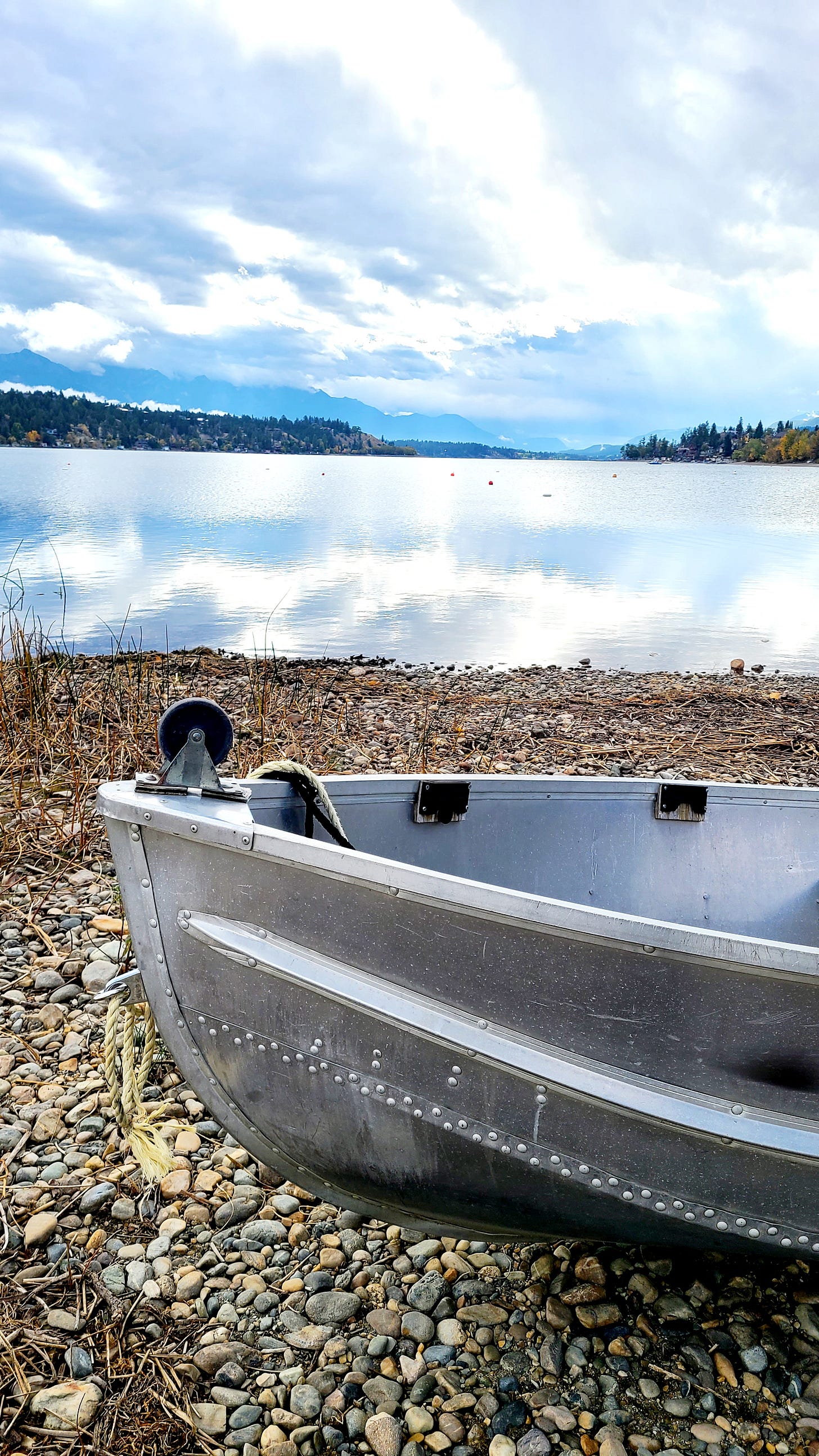 Photo of a boat on the shore at Lake Windermere, BC