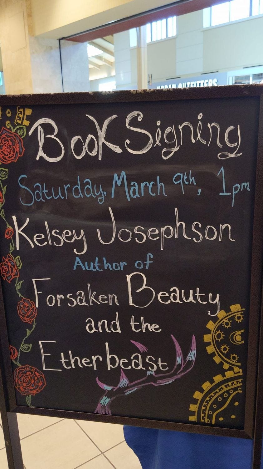 Chalkboard decorated with roses and gears. Text reads, "Book Signing Saturday, March 9th 1pm. Forsaken Beauty and the Etherbeast Kelsey Josephson."