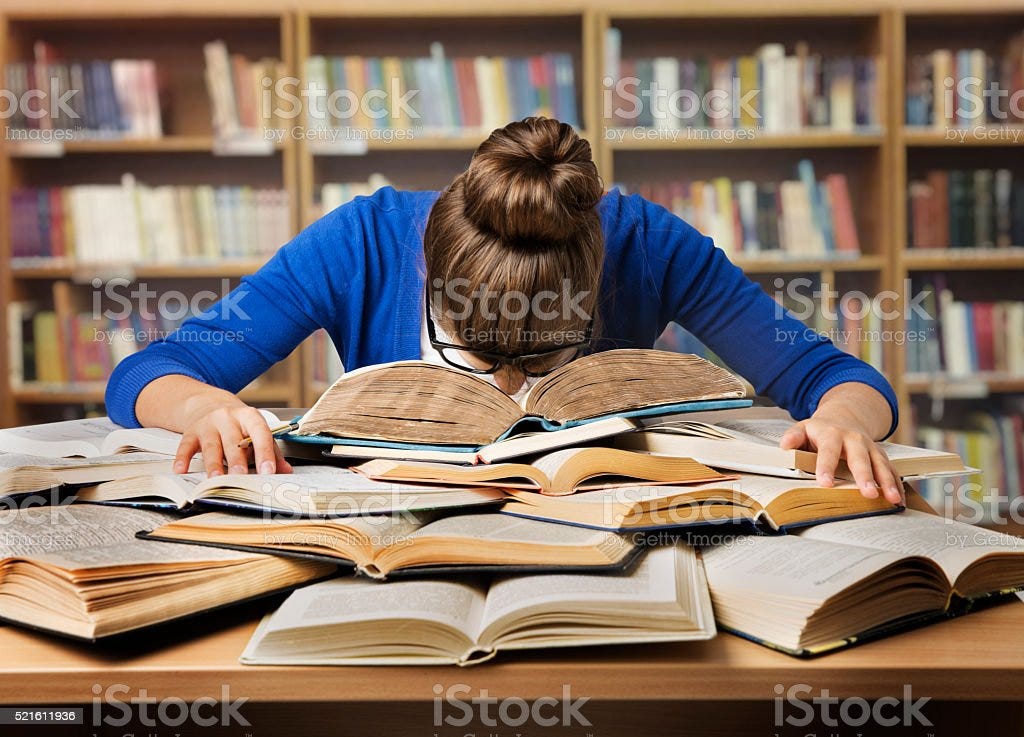 Student Studying Sleeping On Books Tired Girl Read Book Library Stock Photo  - Download Image Now - iStock