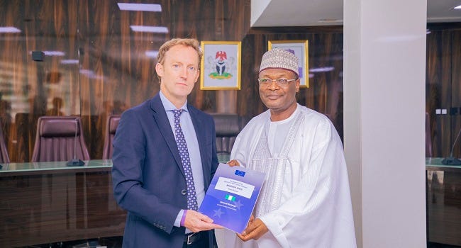 EU Observer Mission presenting final report of 2023 general elections to INEC Chairman Mahmood Yakubu.