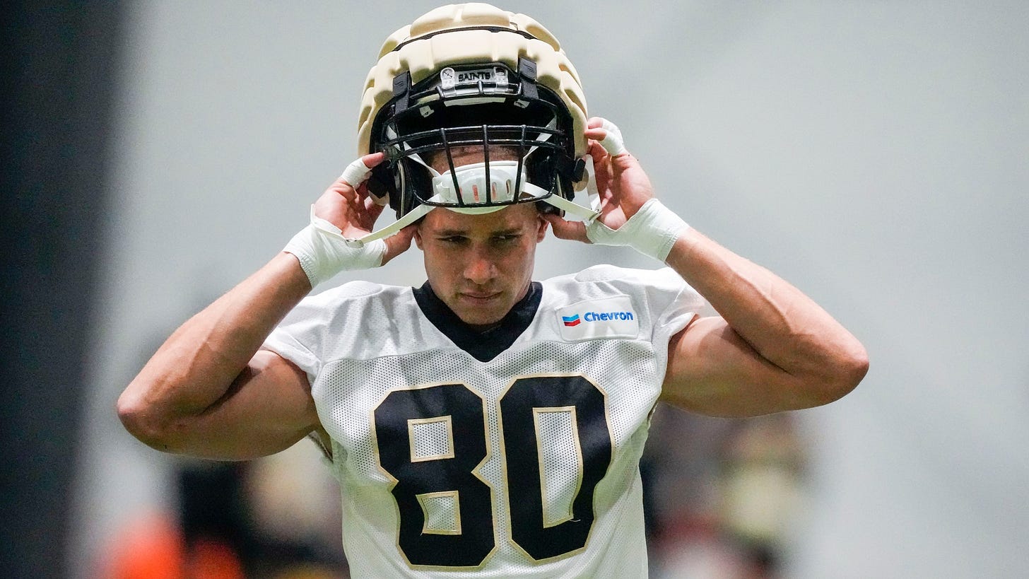 New Orleans Saints tight end Jimmy Graham (80) dons his helmet at the NFL team's football training camp in Metairie, La., Friday, Aug. 4, 2023. (AP Photo/Gerald Herbert)
