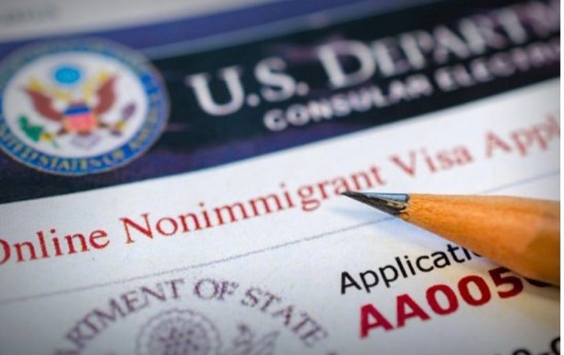 Close-up of a pencil on a visa application

AI-generated content may be incorrect.