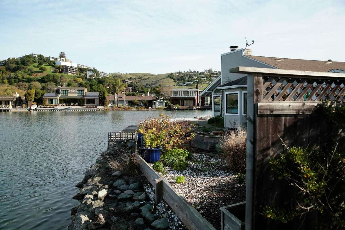 A view of homes across the Belvedere Lagoon from the Mallard Pointe neighborhood, right, in Belvedere. A proposed housing development in this Marin County area is being challenged by a local nonprofit.