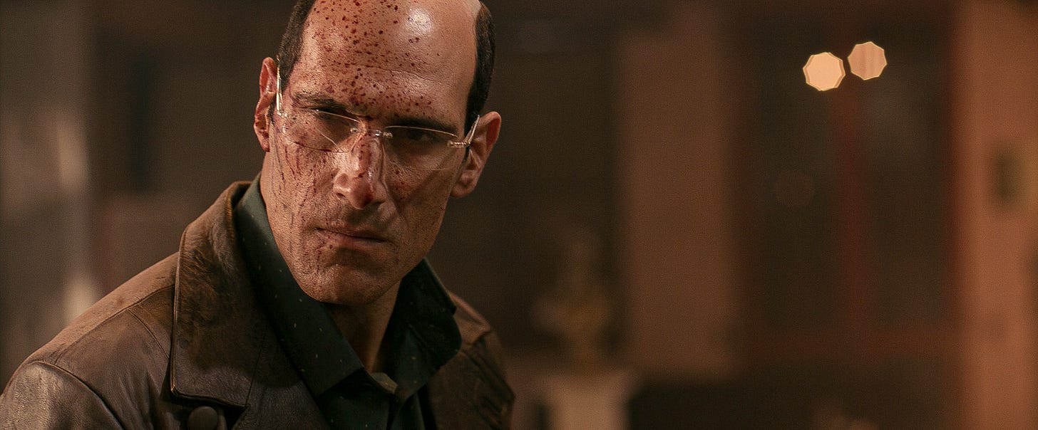 Marko Zaror, with blood splattered on his face, in Diablo