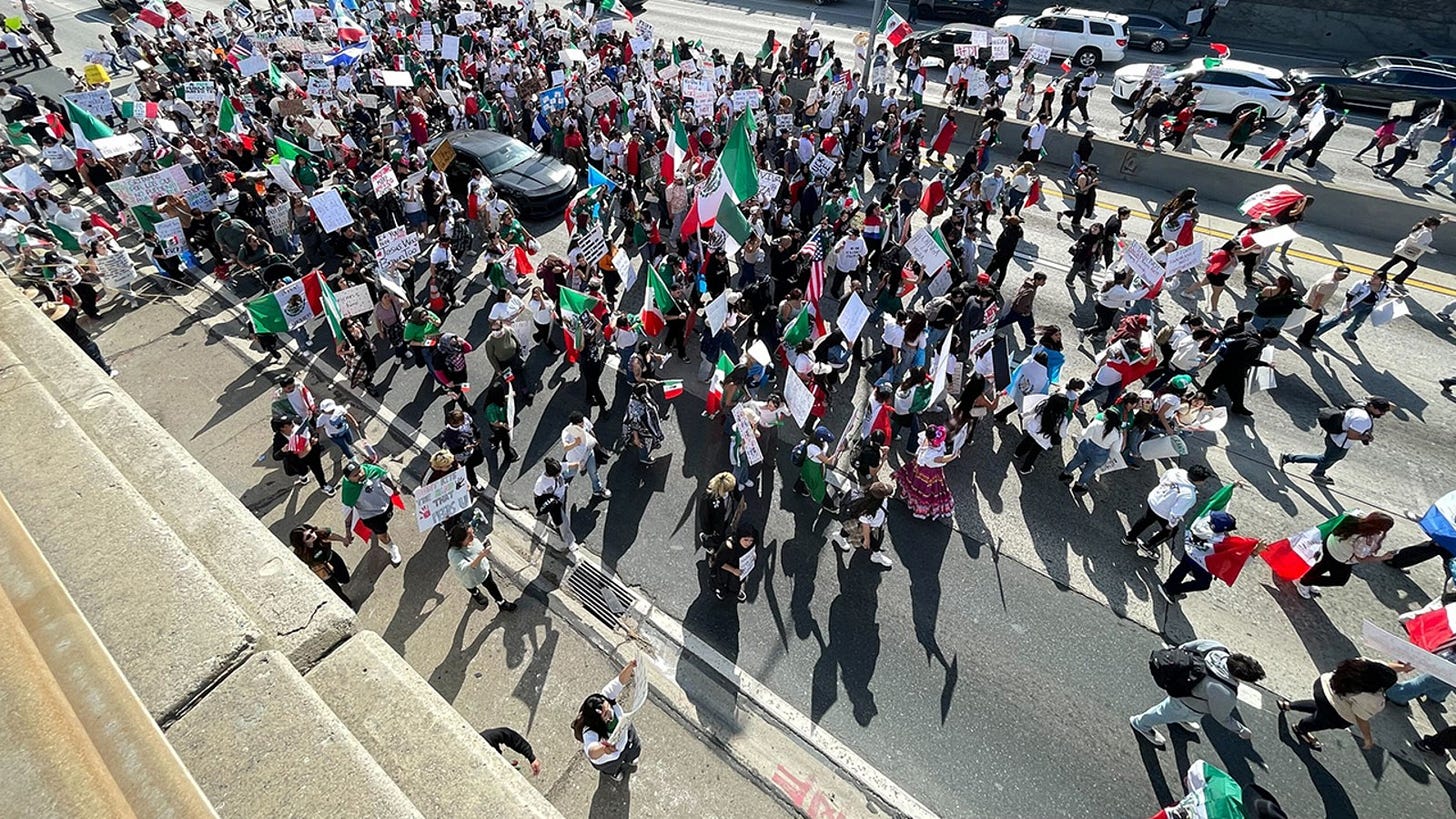 May be an image of 1 person, road and crowd