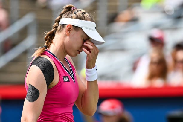 Elena Rybakina of Kazakhstan reacts after losing a point against Liudmila Samsonova on Day 7 during the National Bank Open at Stade IGA on August 13,...