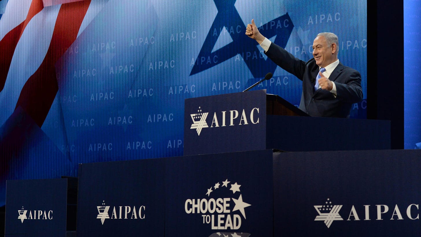 Israeli PM B. Netanyahu gives thumbs up at AIPAC podium