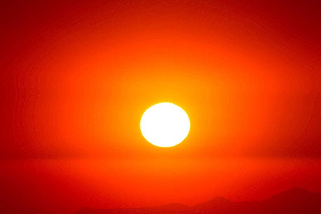 A very hot-looking sun represents the increase in global warming