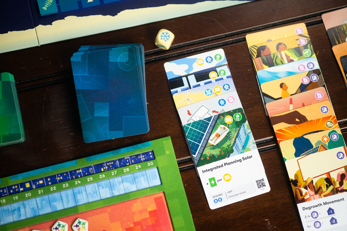 A player's tableau in the cooperative game Daybreak.