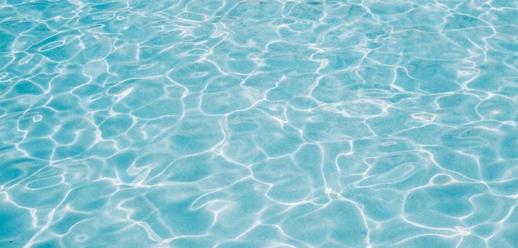 A detail from the water of a swimming pool