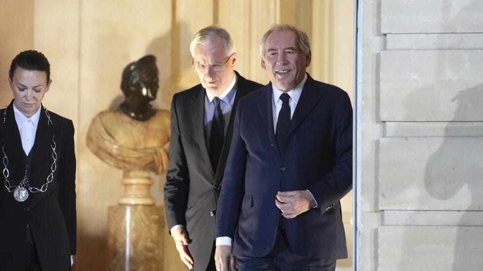 François Bayrou (right) took over as Prime Minister from Michel Barnier (left) on 13 December.