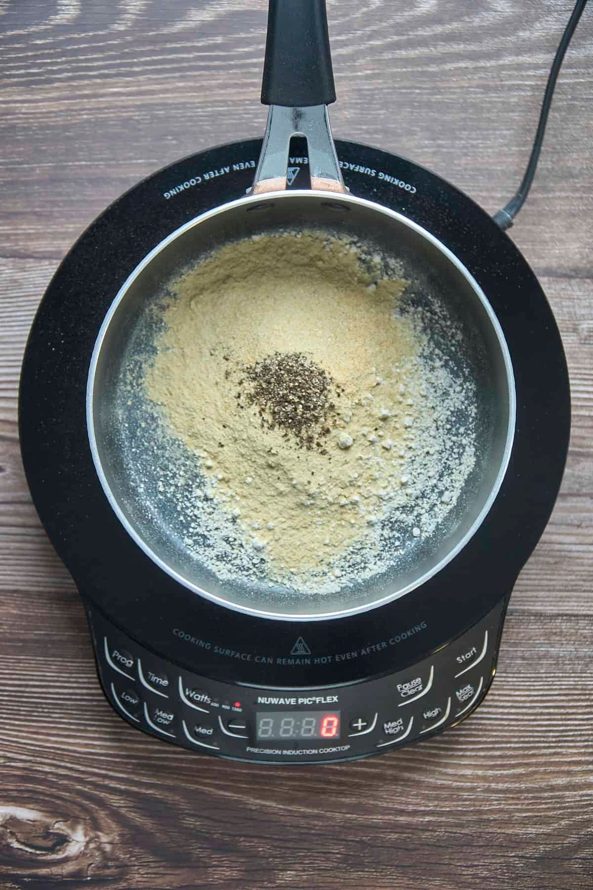 dry gravy ingredients in a pan 