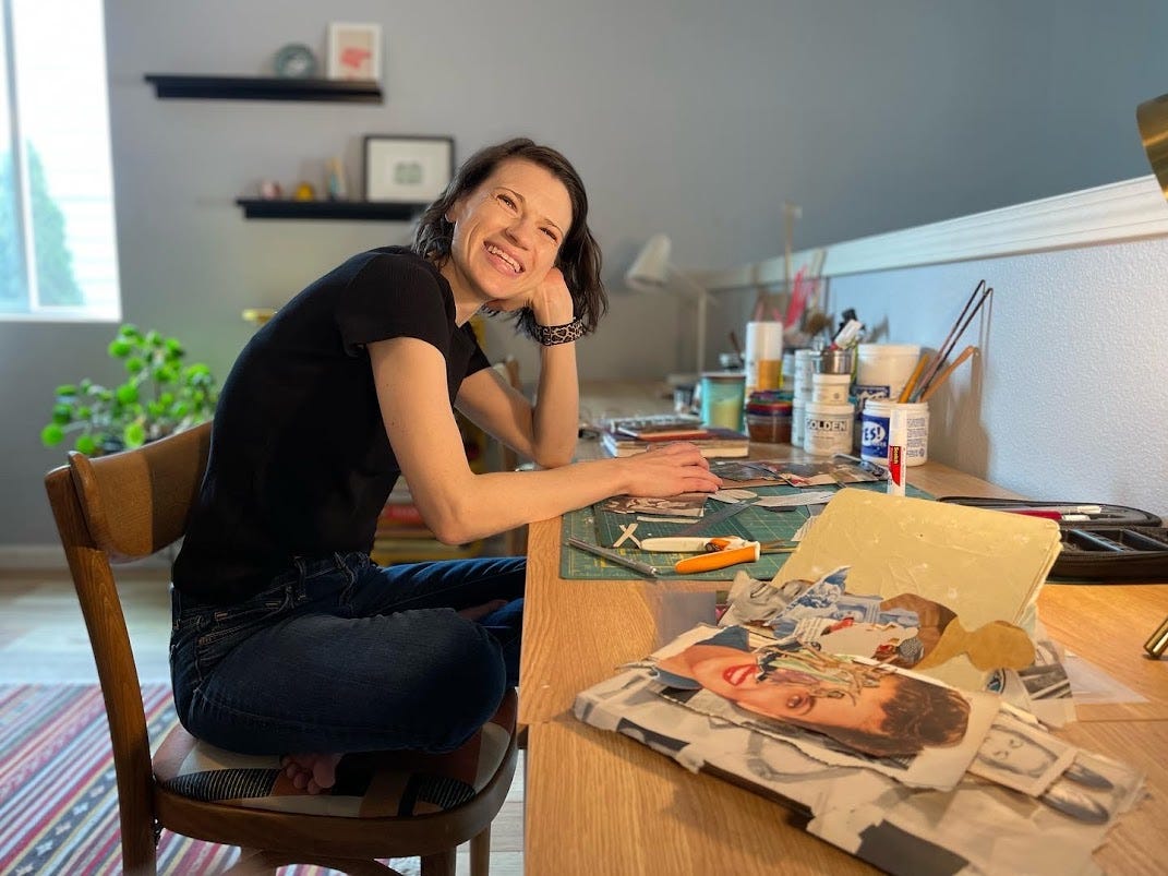 a thin white woman sits cross legged at a desk with scissors, magazine papers, and glue on a desk in front of her