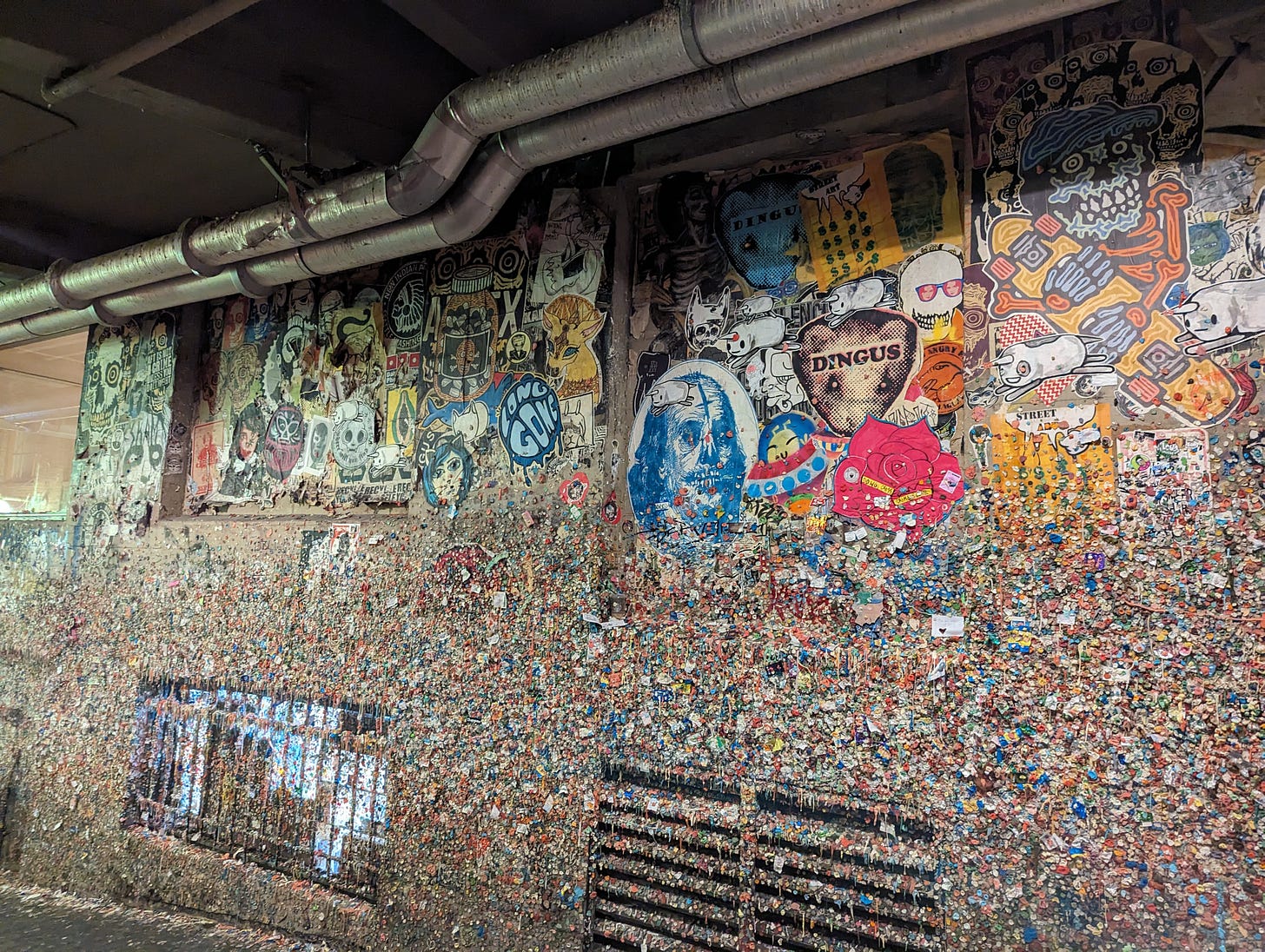 An alleyway in Seattle that is literally covered in gum. Bright speckled gum covers the walls, along with awesome punk art, like Benjamin Franklin's face made to look like a skull.