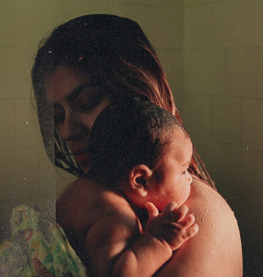 topless woman carrying baby inside bathroom topless woman carrying baby inside bathroom