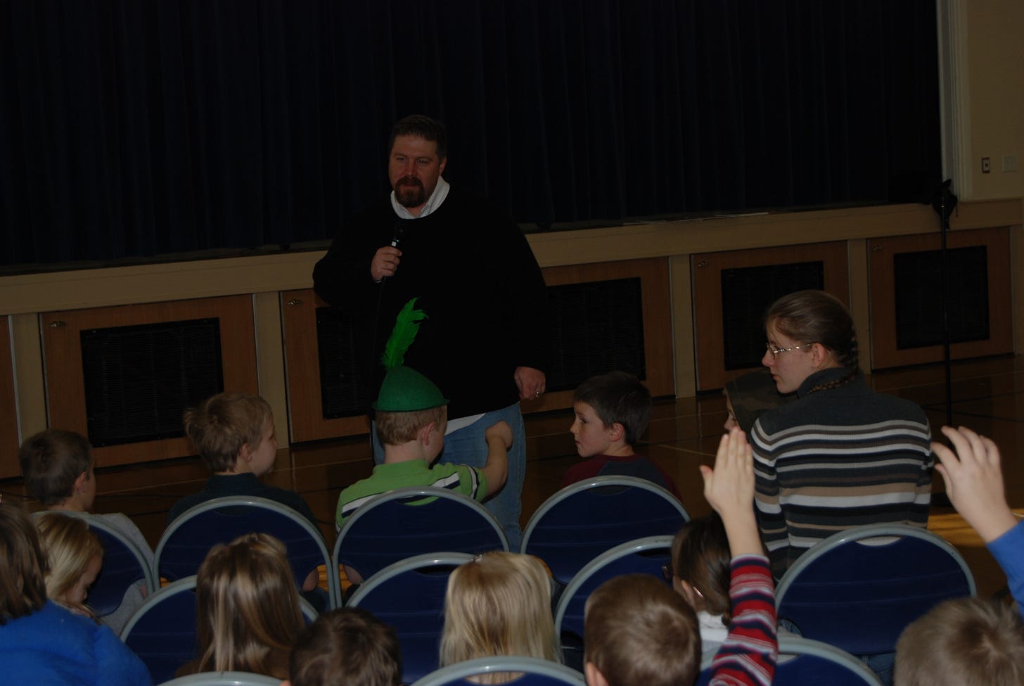 Jaime Buckley talks at a school