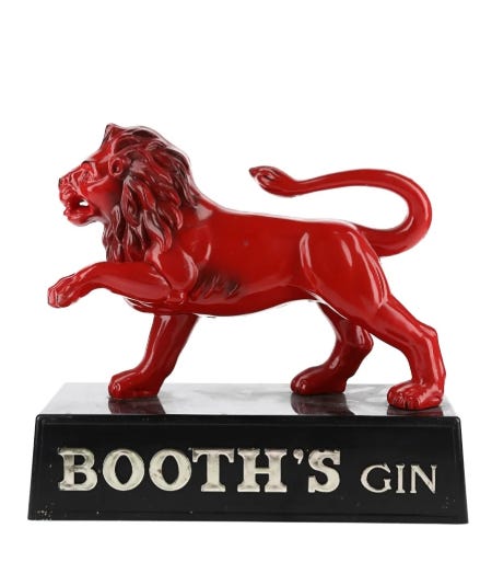 A shiny red model lion advertising Booth's gin