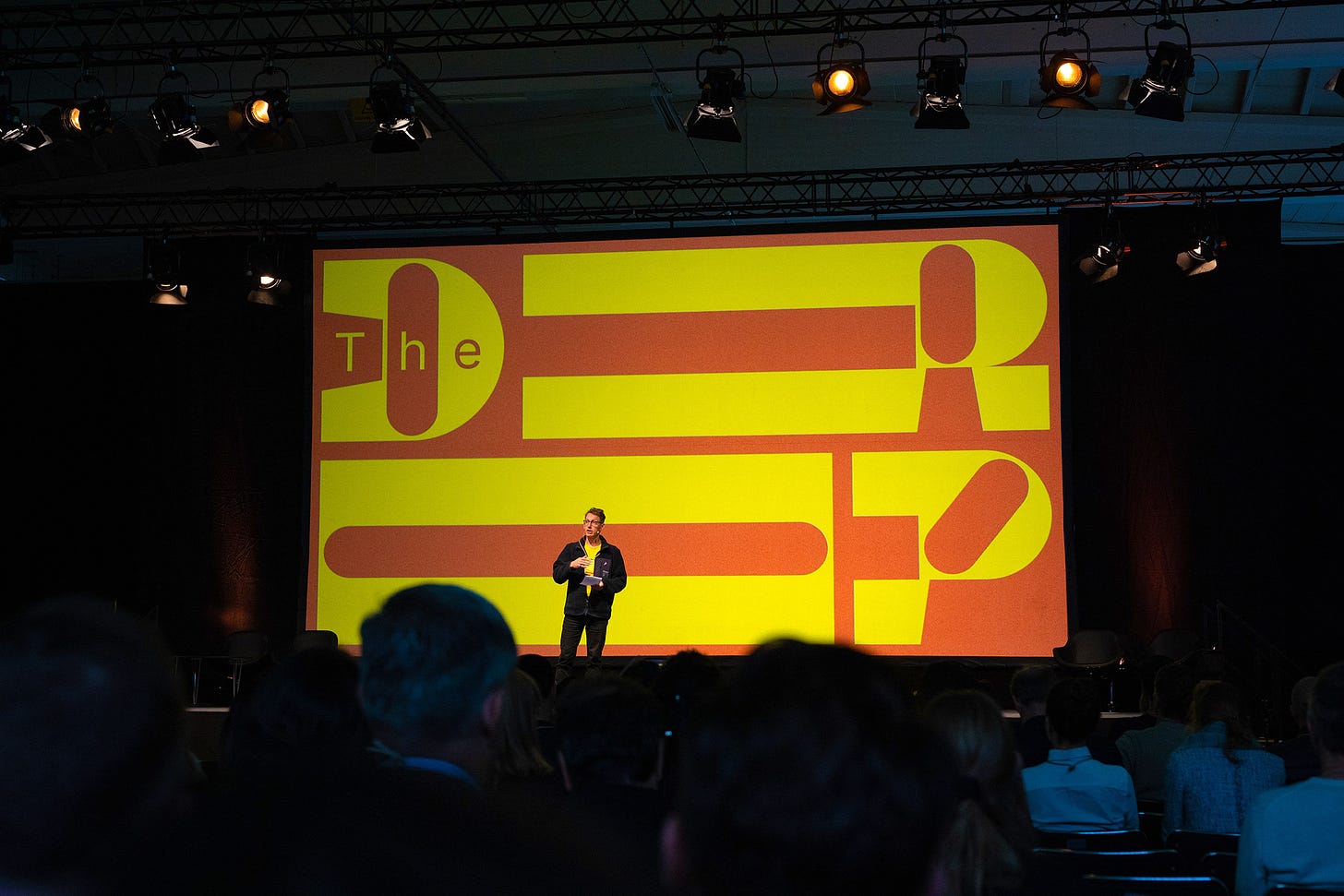Hampus Jakobsson speaks to a large crowd on the main stage of The Drop conference in Malmö, Sweden, in September 2022.