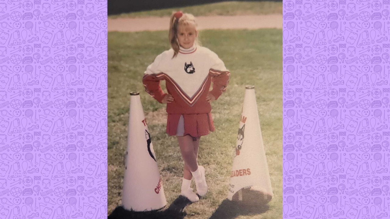 little me posing for a cheerleading photo in my huskies uniform