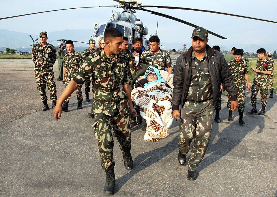 File:The Indian Air Force (IAF) and Nepal army personnel helping a stranded woman to take to a safer place being flown by an IAF MI17 V5 helicopter at Kathmandu airport on April 26, 2015, following a massive earthquake hit Nepal.jpg File:The Indian Air Force (IAF) and Nepal army personnel helping a stranded woman to take to a safer place being flown by an IAF MI17 V5 helicopter at Kathmandu airport on April 26, 2015, following a massive earthquake hit Nepal.jpg