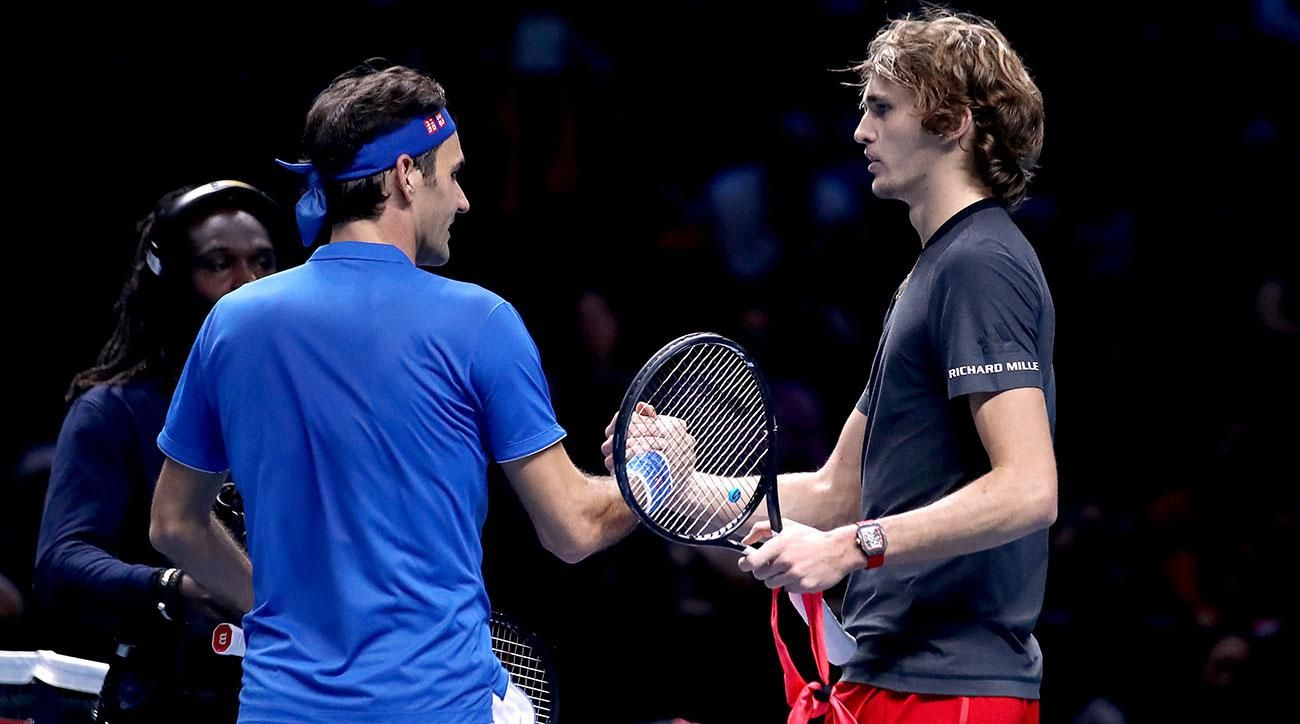 roger federer shaking alexander zverev hand after beating off atp finals