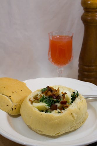 Creamy Fish Chowder served in a fresh bread bowl, with blood orange soda. So filling and delicious. 