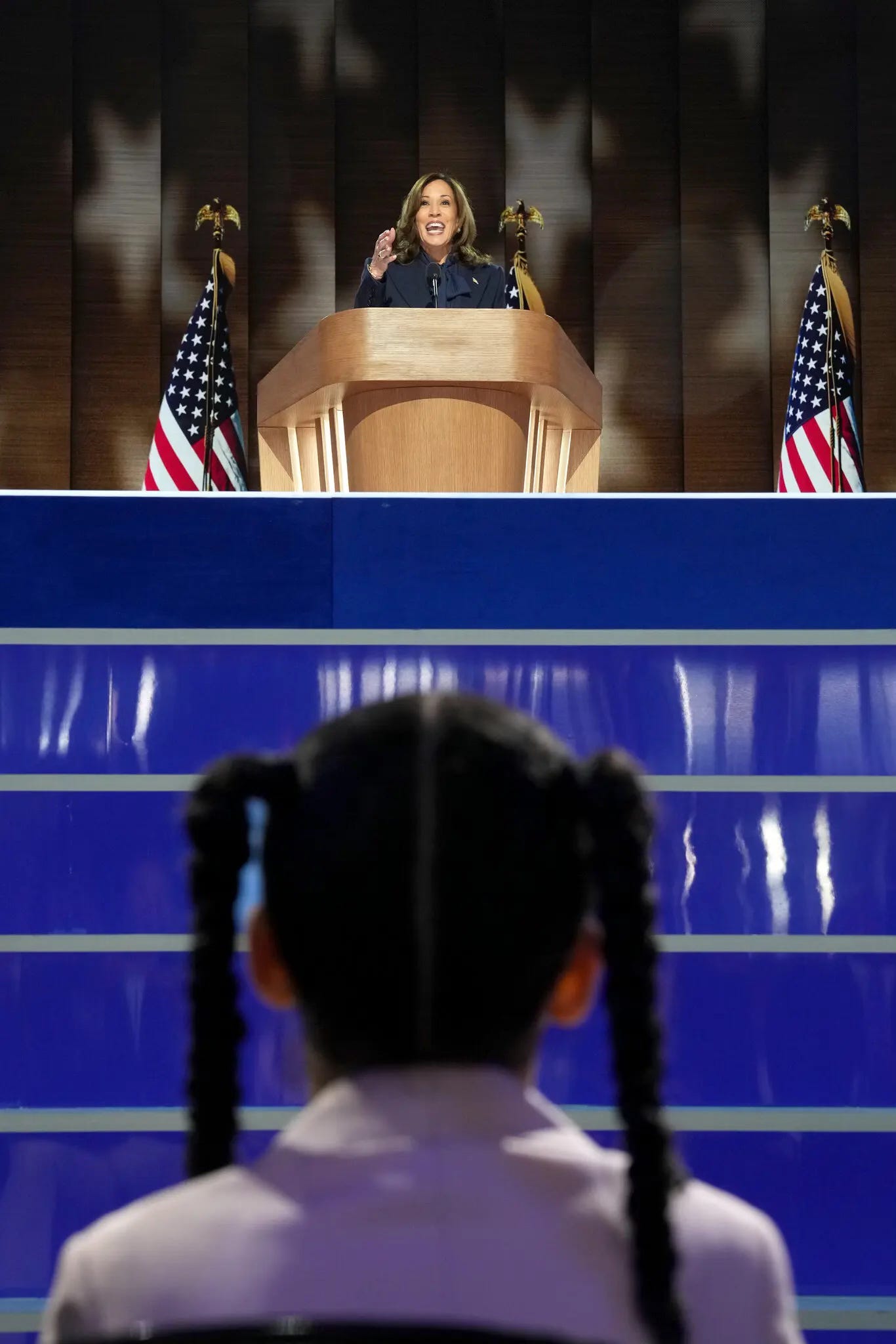 True to the thousand-word adage, however, Todd Heisler’s astonishing photo of Amara Ajagu watching her great-aunt, Kamala Harris, deliver her convention acceptance speech was one for the ages.