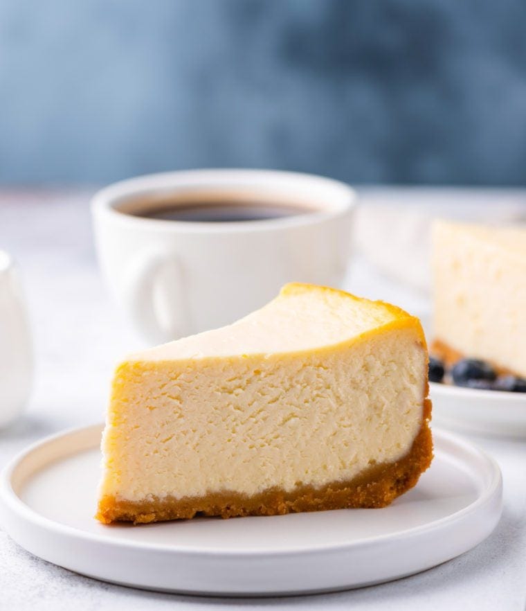 Slice of cheesecake on a plate.