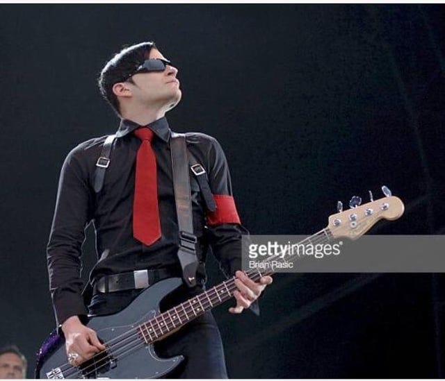r/Interpol - My friend and I had a debate about Carlos D’s style. What are your thoughts on the red band around the arm look?