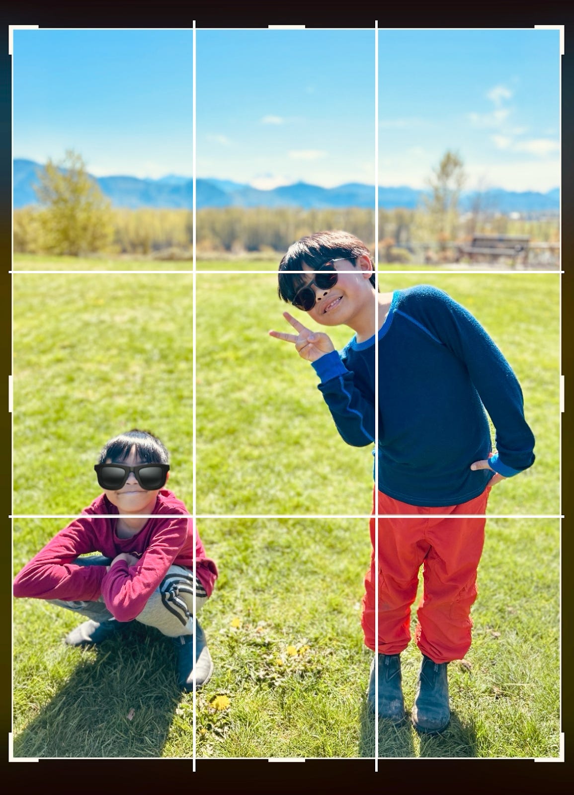 Two kids posing outside on a sunny day, framed according to the rule of thirds.