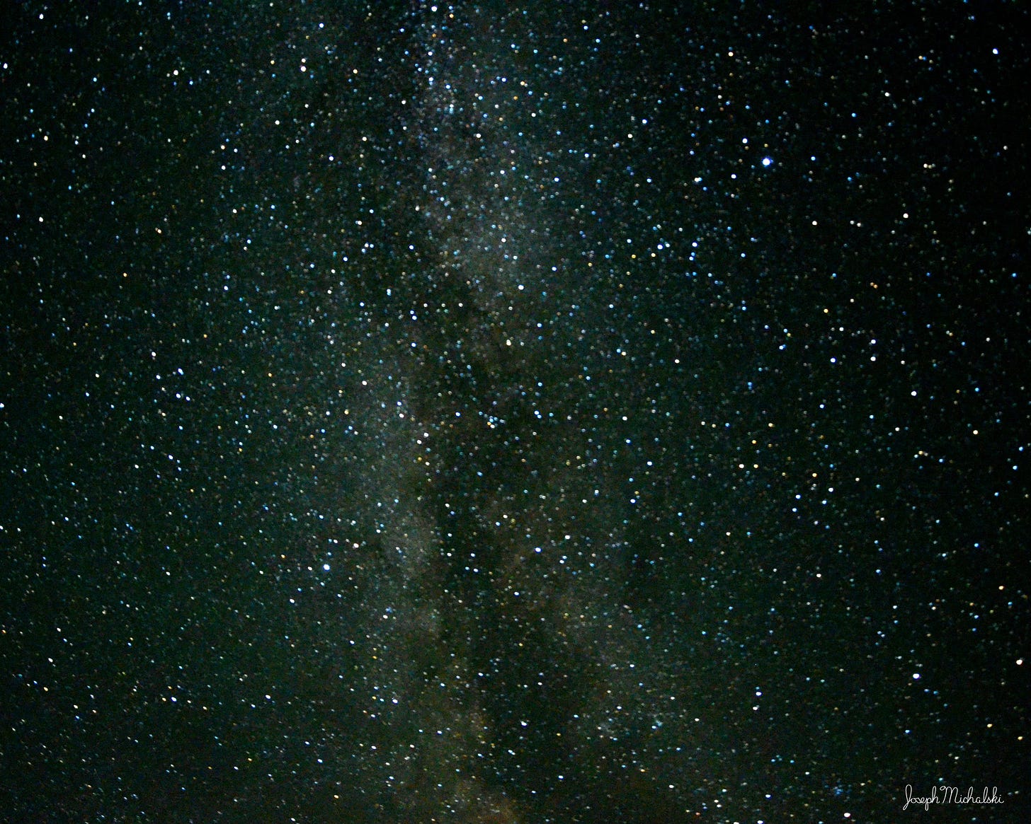 A long-exposure image shows the Milky Way galaxy.