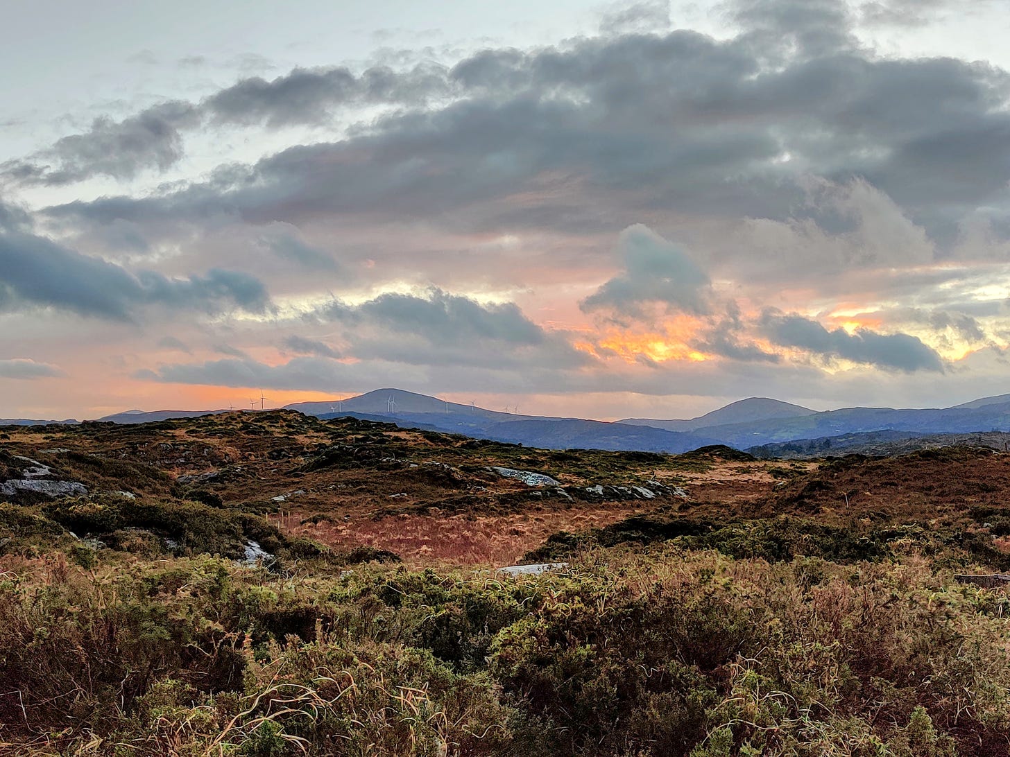 sunset over distant Sheehy mountains