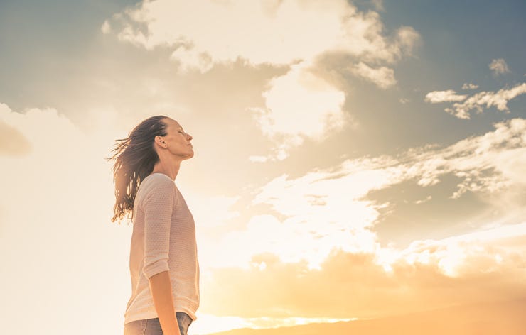 woman is happy and content with what she has