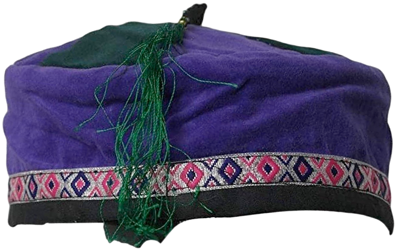 Purple velvet smoking cap with diamond-patterned band and green tassle