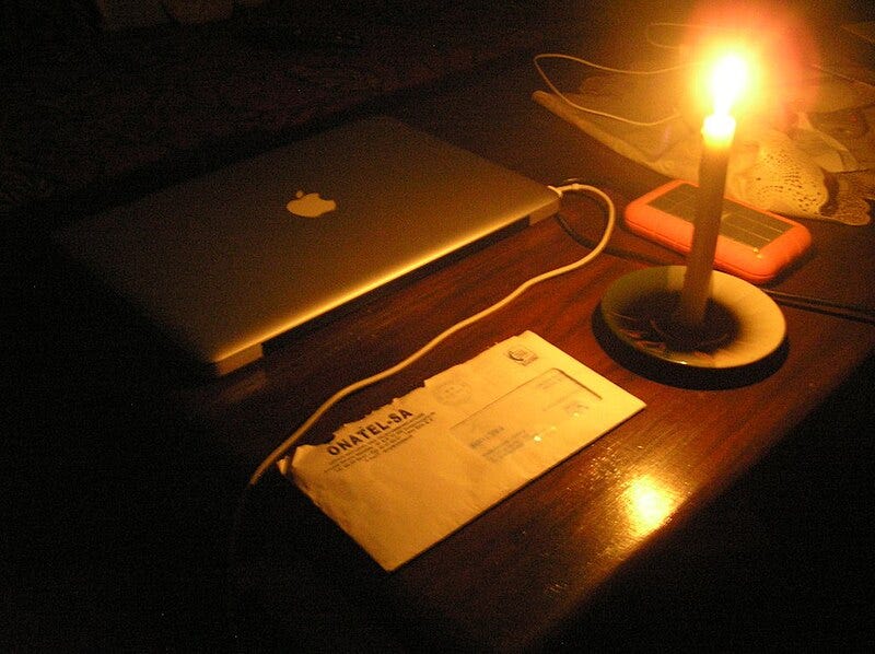 File:Candle on table in Burkina Faso, 2009.jpg