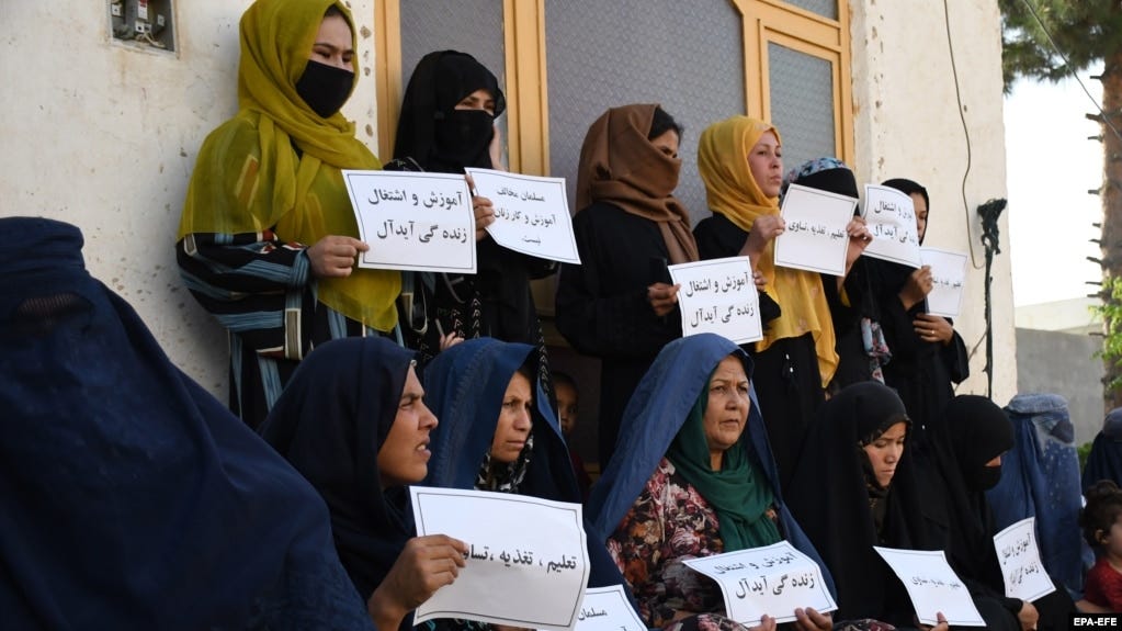 Afghan women hold a protest to demand their right to education and employment in Mazar-e-Sharif earlier this year. 