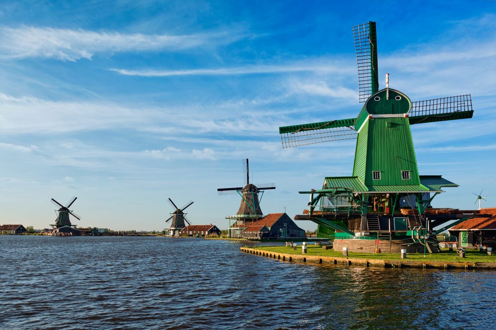 Windmills at Zaanse Schans in Holland on sunset. Zaandam, Nether ...