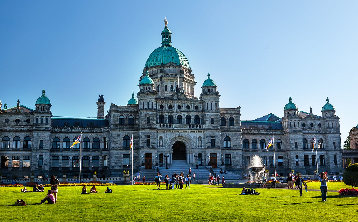 Beautiful stone and tourquoise blue Parliament Building in the capital city of Victoria.