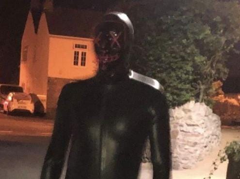 <p>A photo taken of the man dressed in a gimp suit in Claverham in 2019 </p>