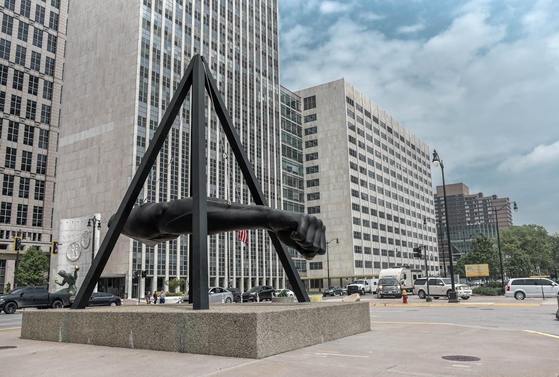 Free Urban scene featuring the iconic Joe Louis Fist in downtown Detroit. Stock Photo